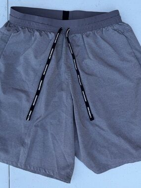Nike Gray Athletic Running Shorts with Reflective Trim